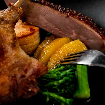 The Point Brisbane Hotel מראה חיצוני תמונה A duck confit with orange and vegetables