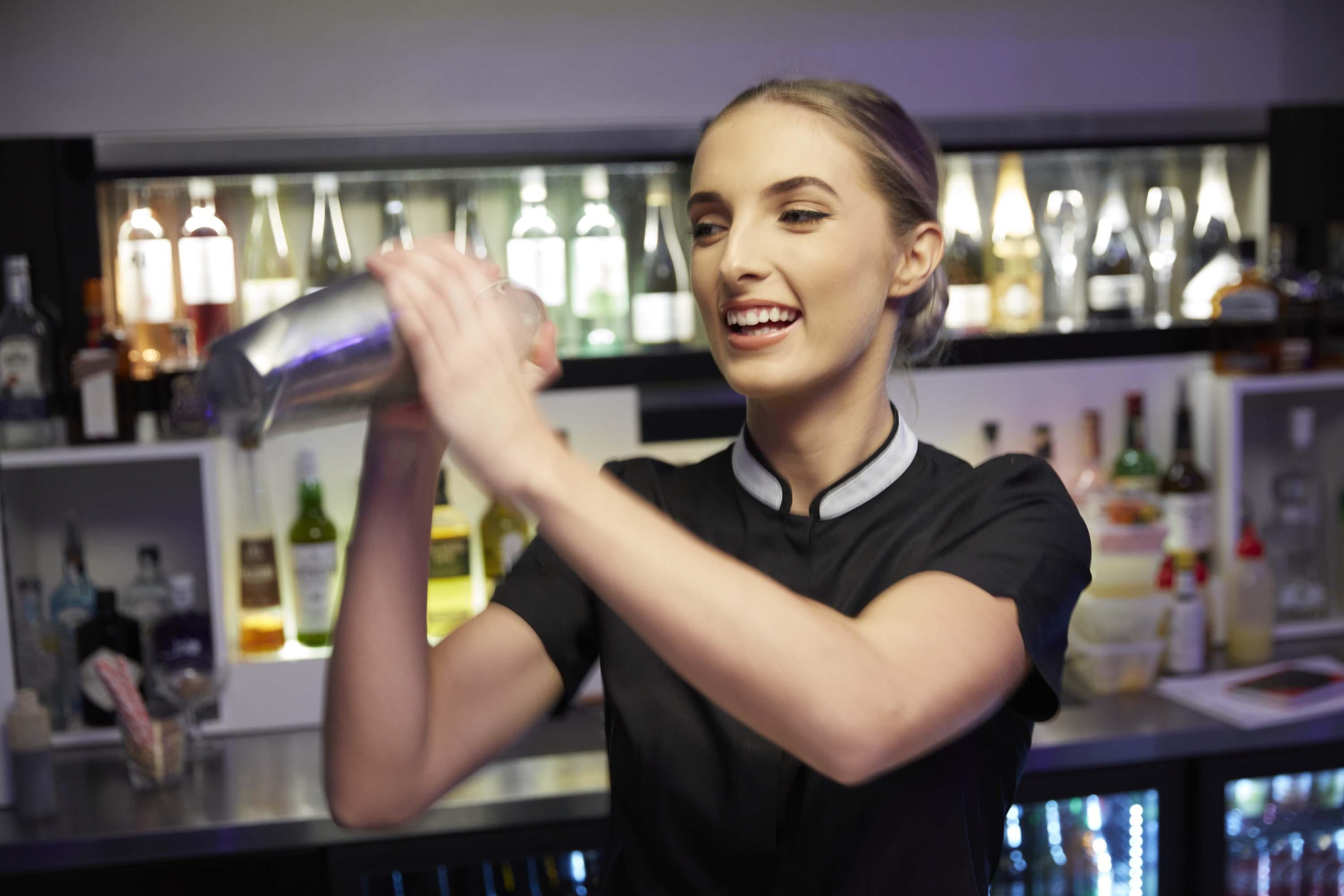 The Point Brisbane Hotel מראה חיצוני תמונה A bartender shaking a cocktail